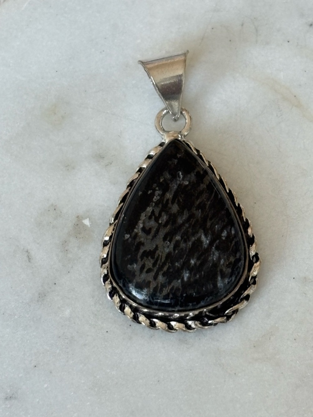 Black Teardrop Stone Pendant in Silver Setting